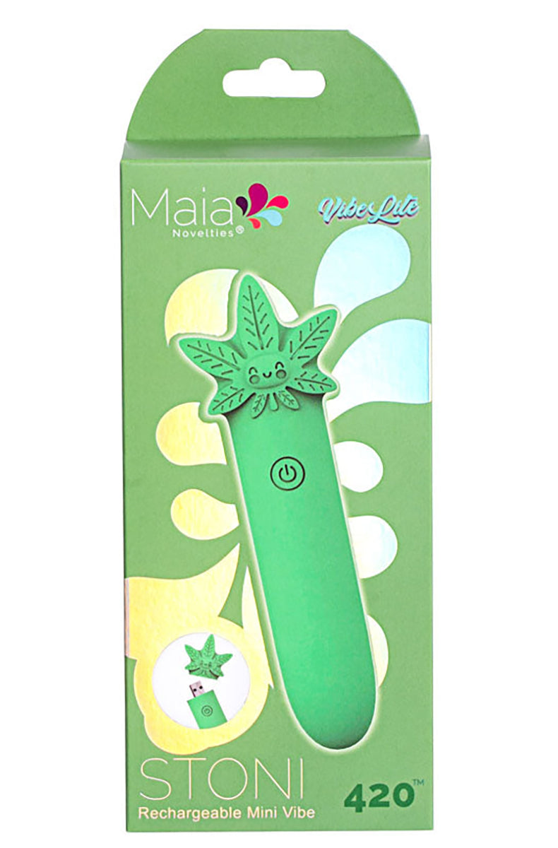 Stoni green silicone bullet beside its retail packaging.