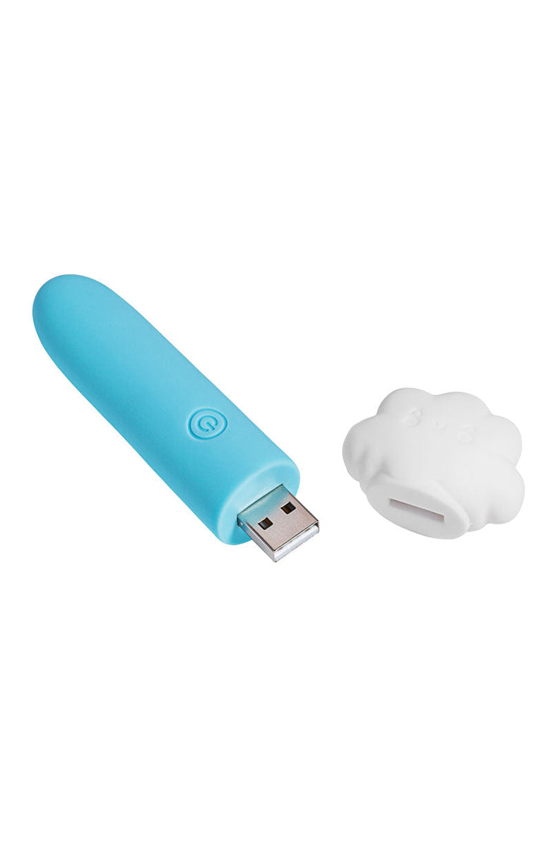 Blue Stormee bullet with built in USB plug exposed and white cloud cap separate