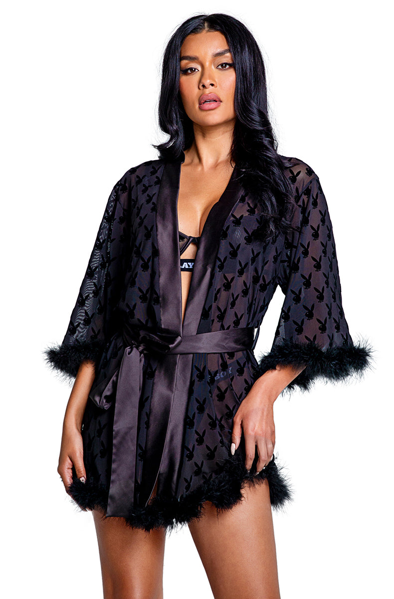 Sheer black mesh kimono mini robe with flocked Playboy bunny print, black satin lapel, marabou trim, and tie sash.