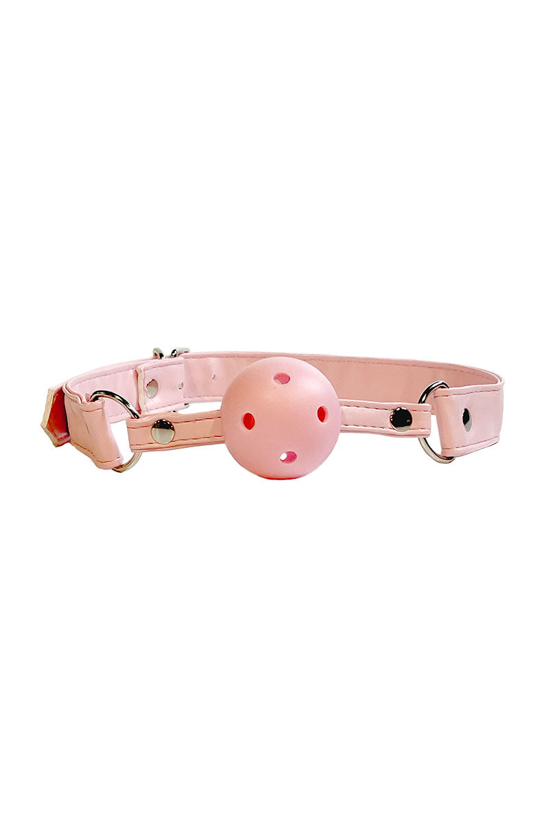 Pink faux leather ball gag strap with silver D-rings and a pink ventilated ball with breathing holes.