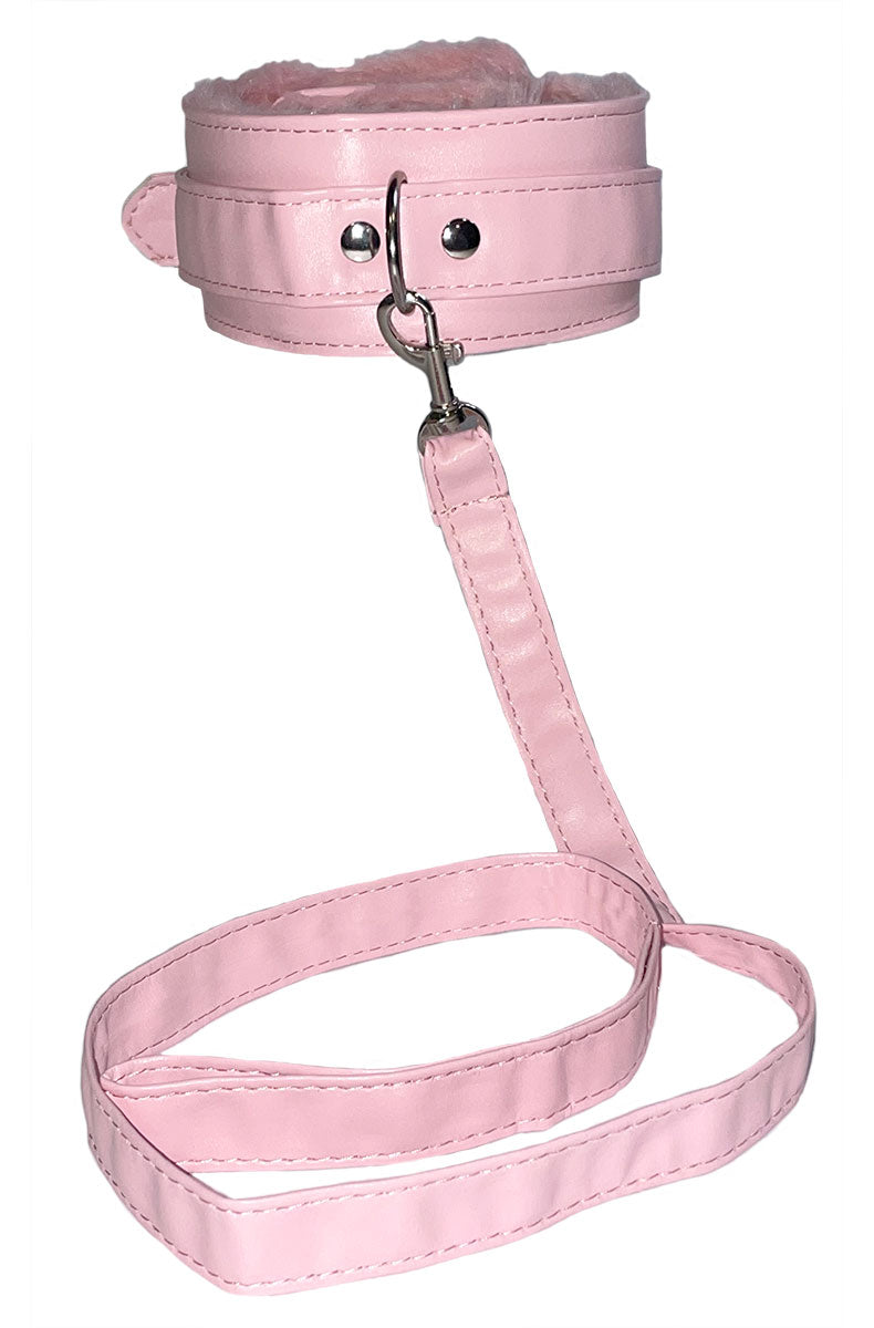Pink faux leather collar with white fur lining attached to a long pink leash with silver snap hook.