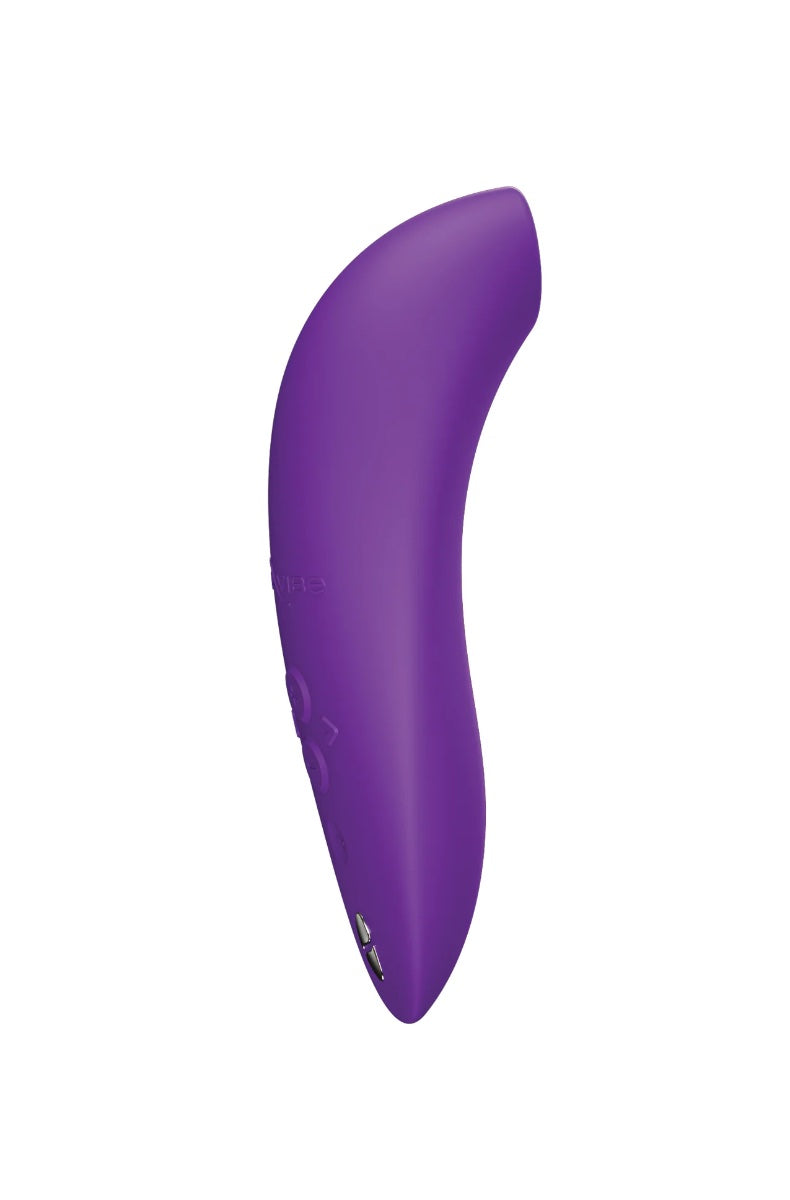 Front view of purple curved silicone air pulse vibrator with oval opening at tip