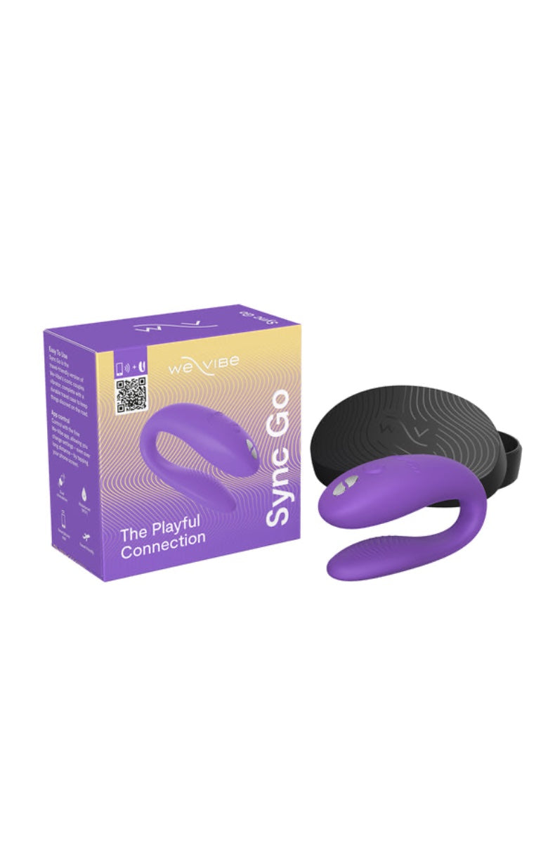 We-Vibe Sync Go retail box next to purple vibrator and black textured travel case