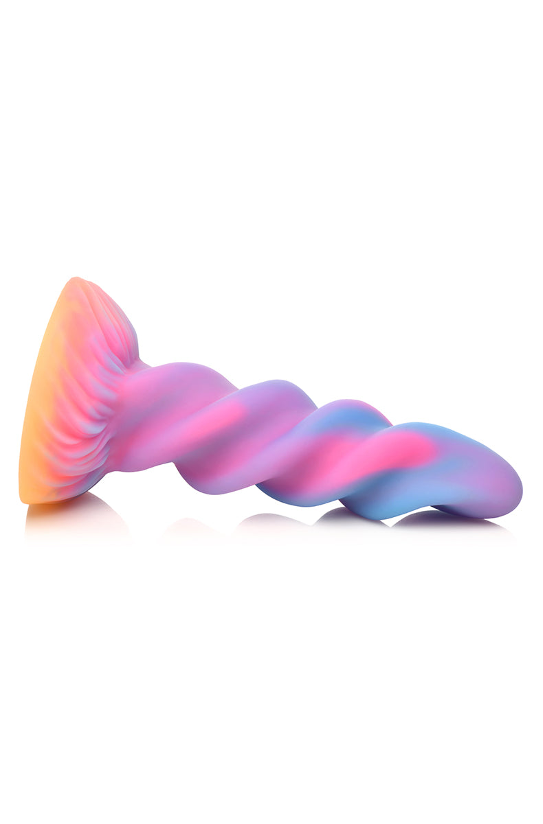 Top-down look at unicorn horn glow silicone dildo showing twisted spiral.