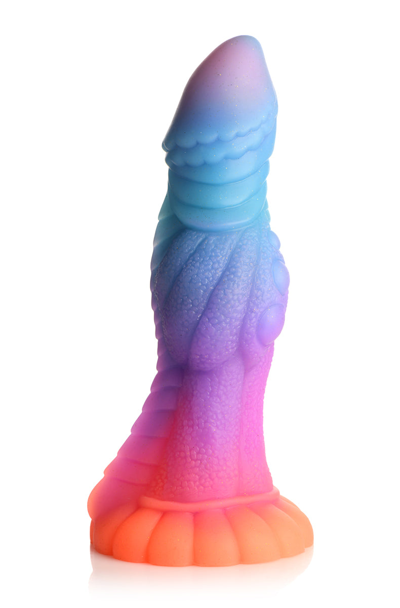 Galactic Alien glow silicone dildo at an angle showing textured fantasy shaft.