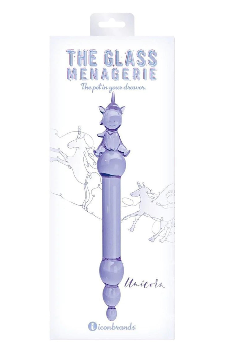 Back view of the purple glass unicorn dildo with beaded tip and unicorn figure handle.
