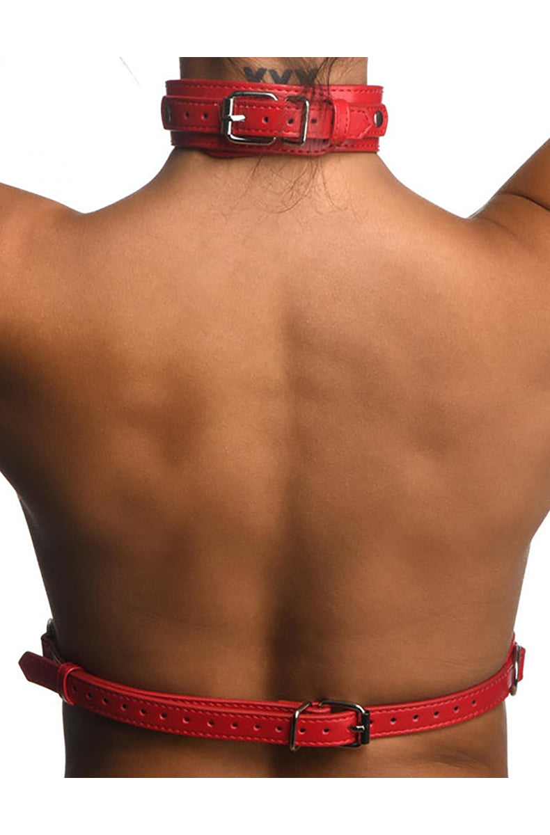 Back closure view of the red BDSM chest harness on a model showing the underbust buckle.