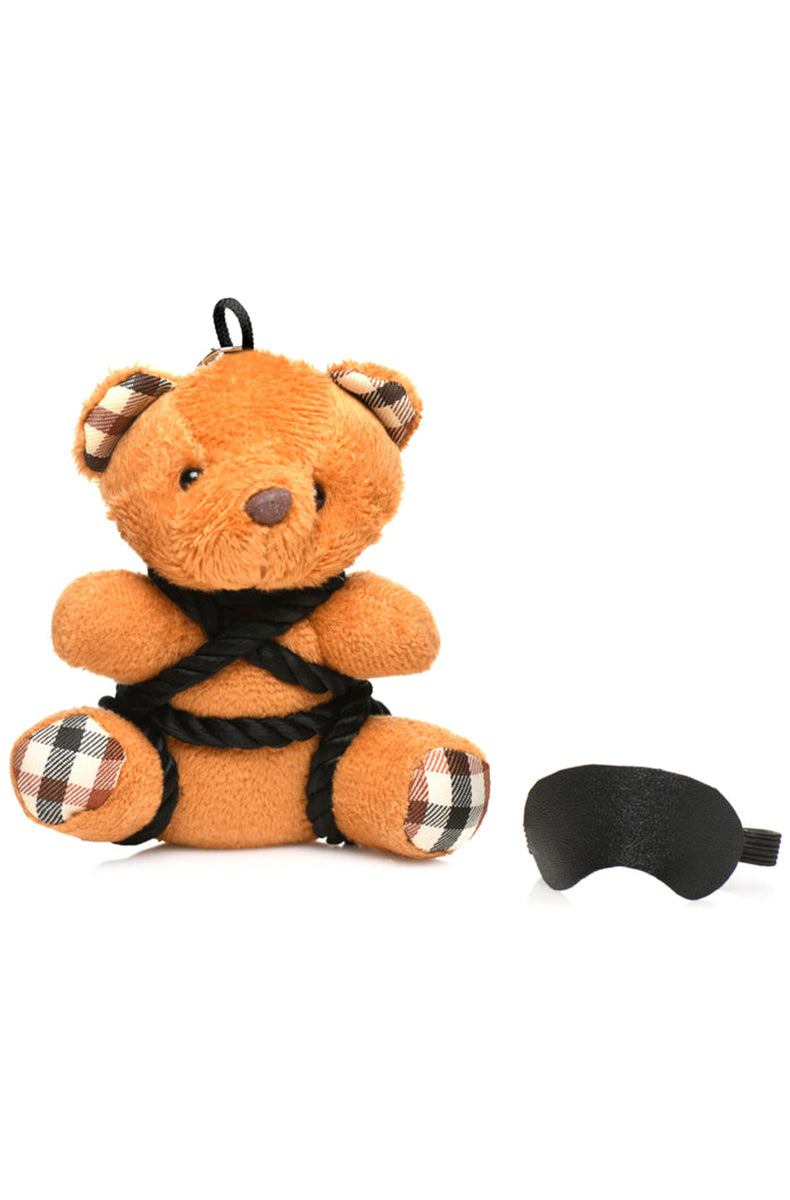 Back view of tan plush teddy bear keychain showing knotted black shibari rope across the back.