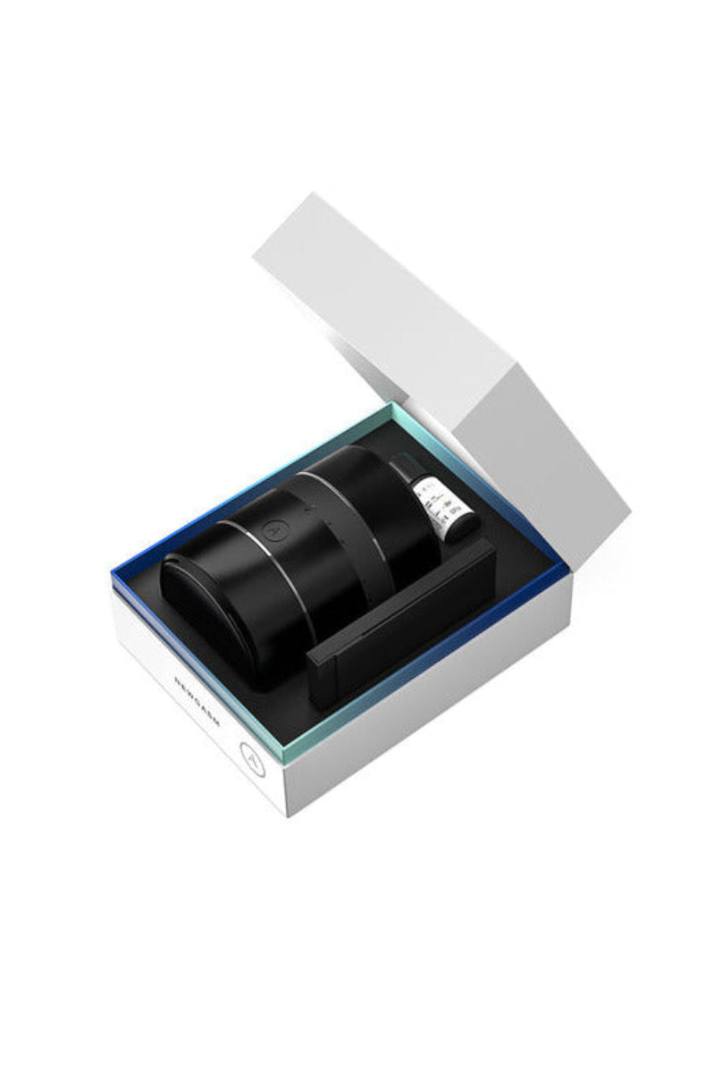 Open Arcwave Voy gift box showing the stroker, a lube sample, and a protector lid