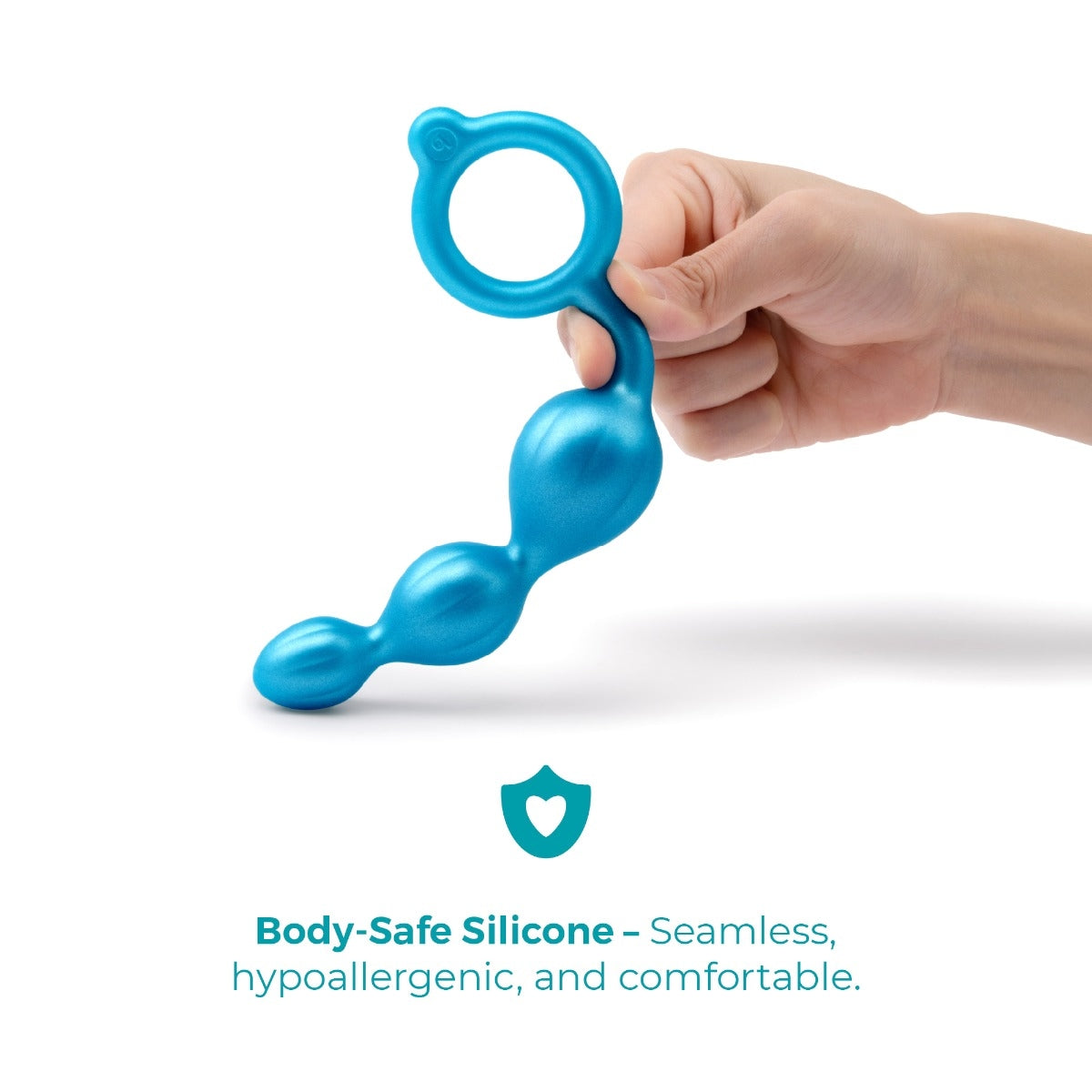 A hand holding the teal anal plug by its finger ring, showing the smooth graduated beads, on white.