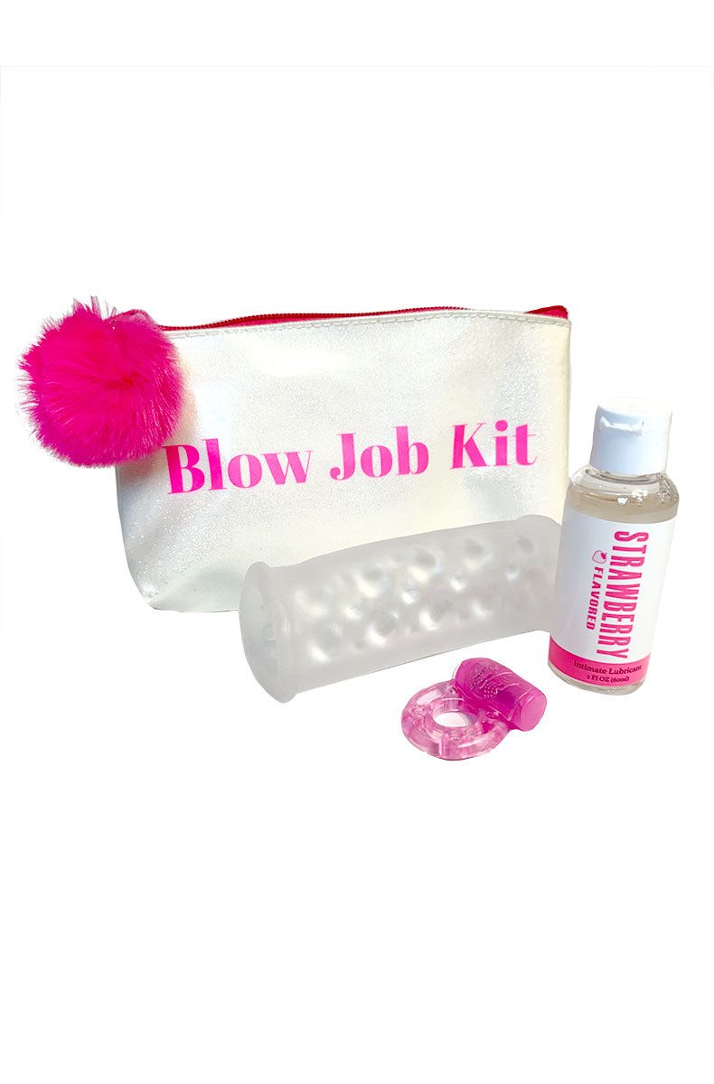 White glitter pouch labeled Blow Job Kit beside a clear TPE textured stroker, pink cock ring, and strawberry lube.