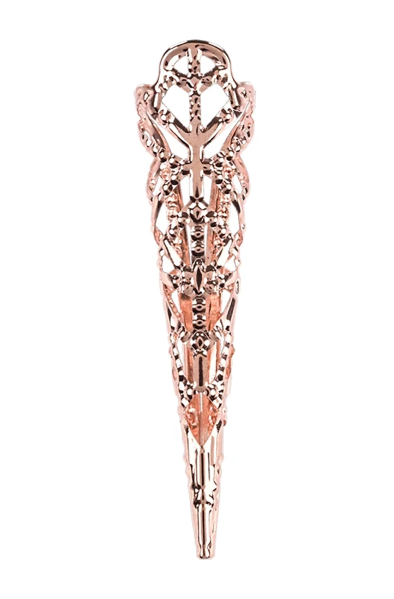 Single ornate rose-gold metal filigree finger claw tip with intricate cathedral lattice cutwork pattern.