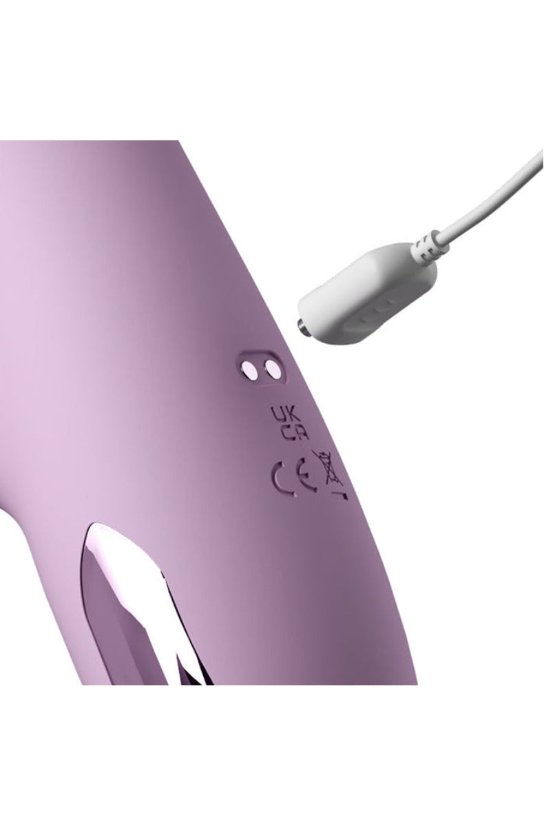 Base of the G-Touch Pulse Pro with its magnetic USB charging cable attached