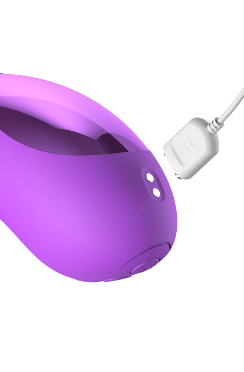 Base of the IntiMotion G Pro with its magnetic USB charging cable attached
