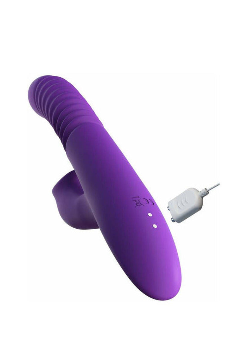 Base of the Ultimate Thrusting Clit Stimulate-Her with its magnetic USB charging cord attached