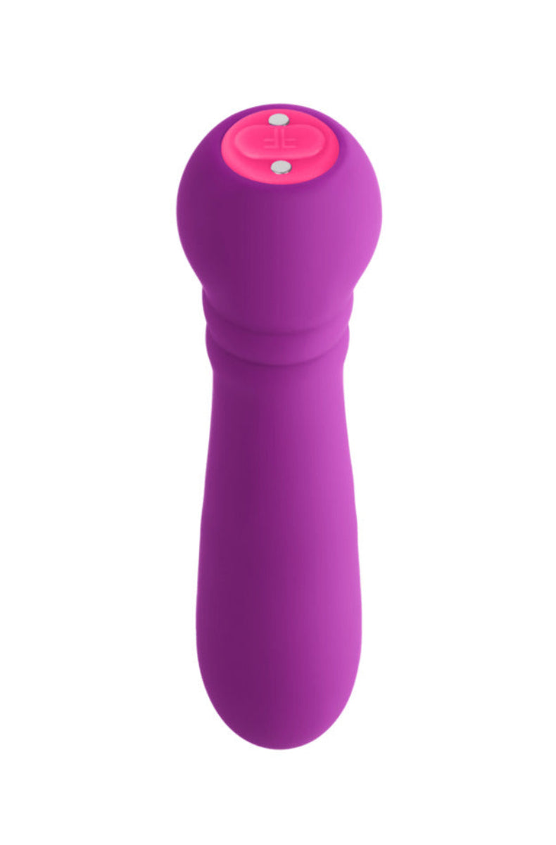 Purple silicone bullet vibrator with a rounded head and pink FemmeFunn button cap, on white.