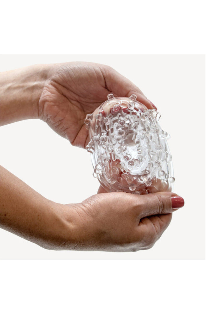 The Handy TrueGrip Gen 2 sleeve held in two hands to show its extended length