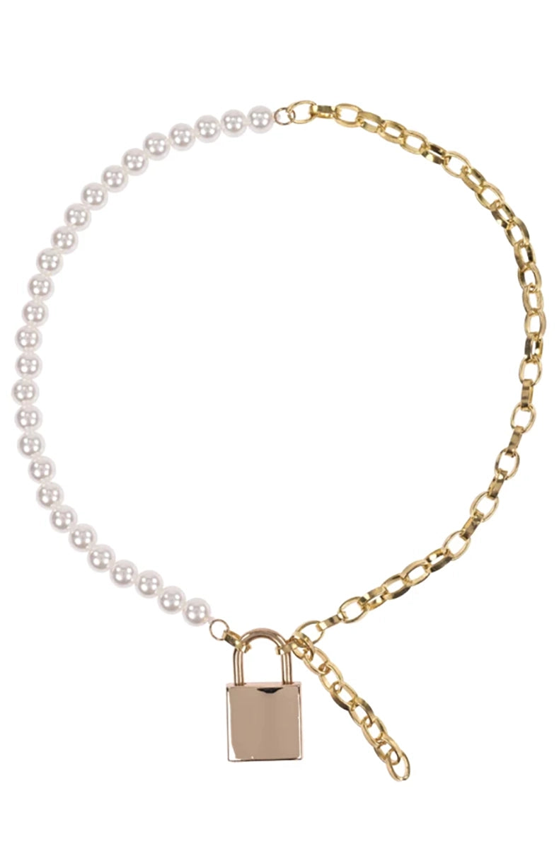 Close-up of the gold padlock front closure joining the white faux-pearl half and the gold cable-chain half of the collar.