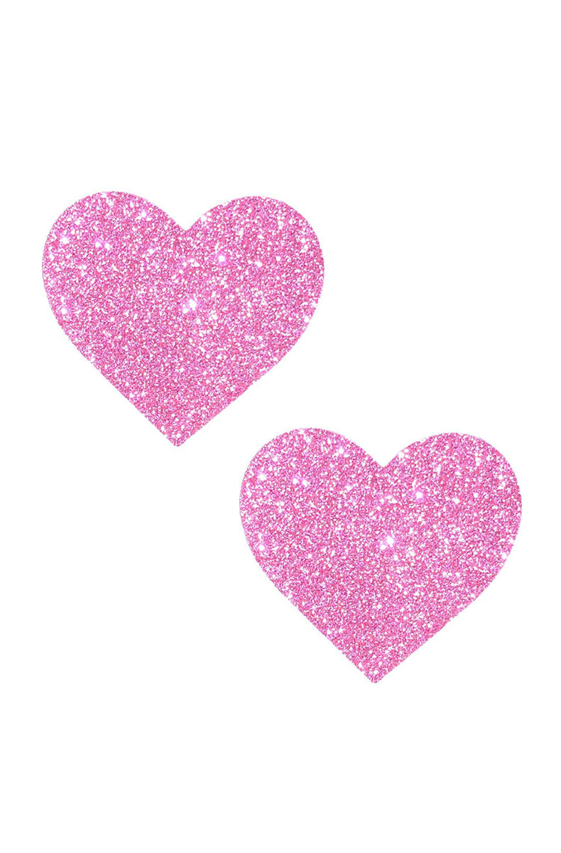 Two heart-shaped pasties in soft baby-pink glitter.