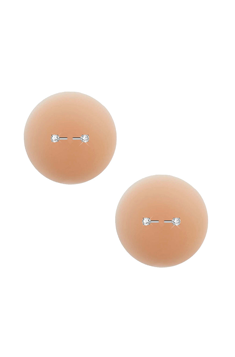 Two round nude silicone pasties with a small horizontal silver-tone barbell and clear rhinestone end caps at the center.