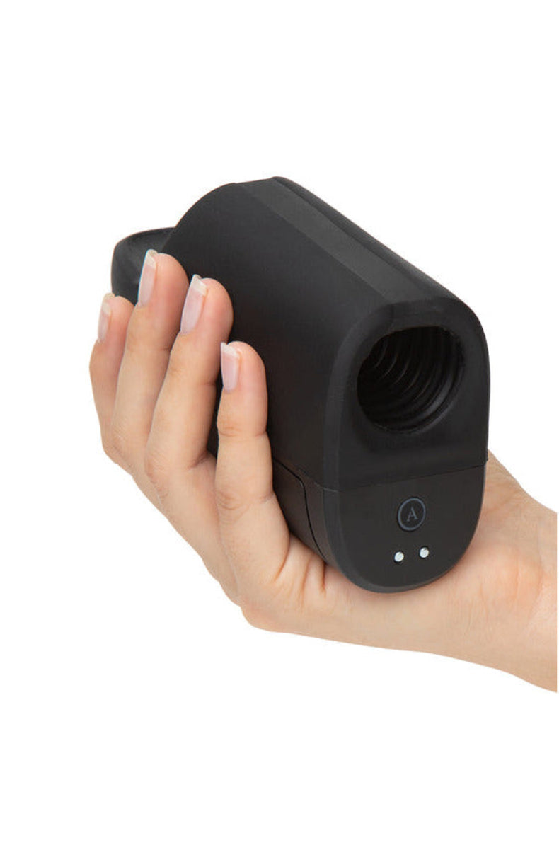 Hand holding the Arcwave Ion 2 to show its compact palm-sized shape