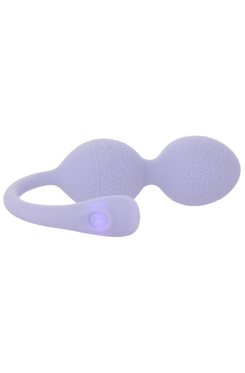 Lavender duo-bead kegel vibrator with the control button lit up on the silicone tail.