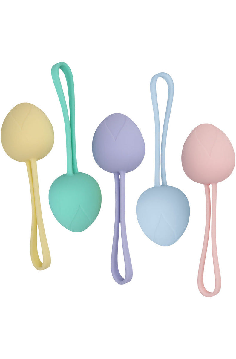 Five berry-shaped silicone kegel balls in pastel yellow, mint, lavender, blue, and pink, each with a pull loop.