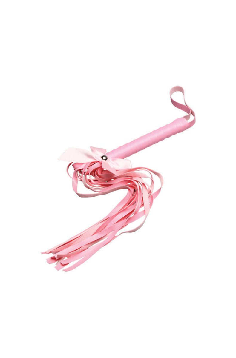 Pink ribbon flogger with a wrapped handle and a bow accent, on a white background.