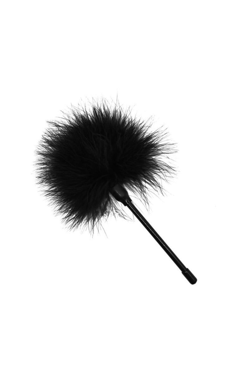 Black feather tickler with a slim handle, on a white background.