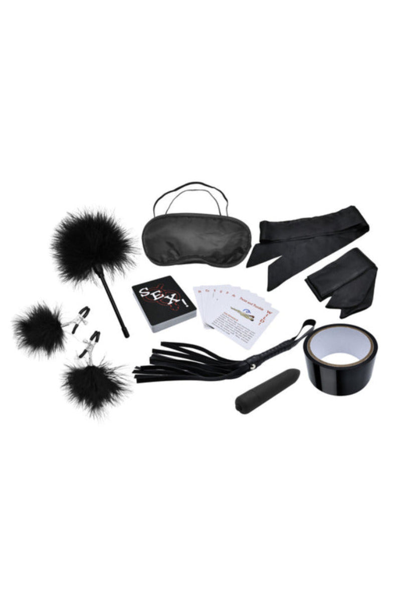 Midnight Moods 10-piece bondage kit laid out: tickler, nipple clamps, blindfold, cards, ties, flogger, bullet vibe, and tape.