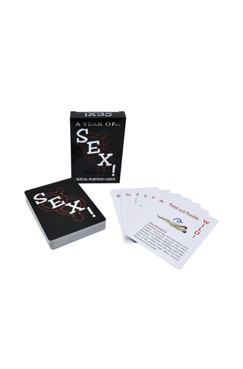 A Year of Sex sexual position card deck with the box and fanned cards, on white.