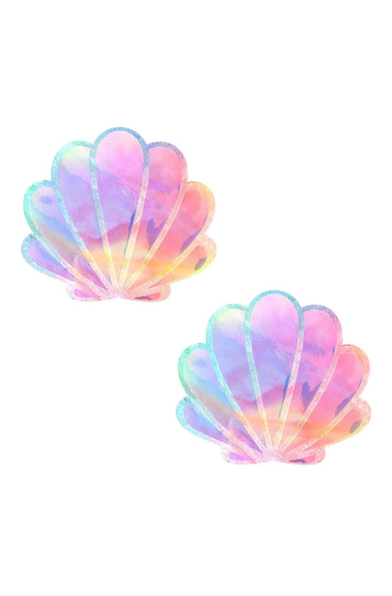 Pair of mermaid seashell nipple pasties in pastel rainbow tie-dye with a glitter edge, on a white background.