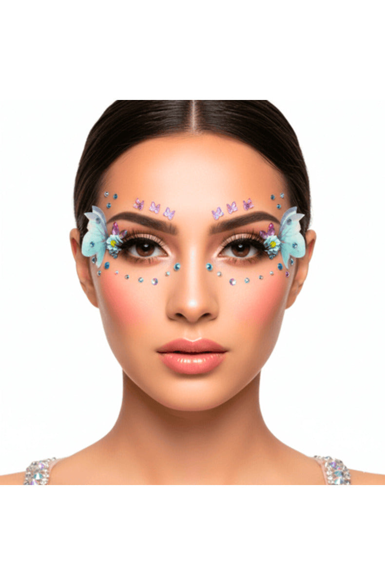 Model wearing the butterfly face jewels with mint butterflies, daisies, and gems framing the eyes and cheeks.