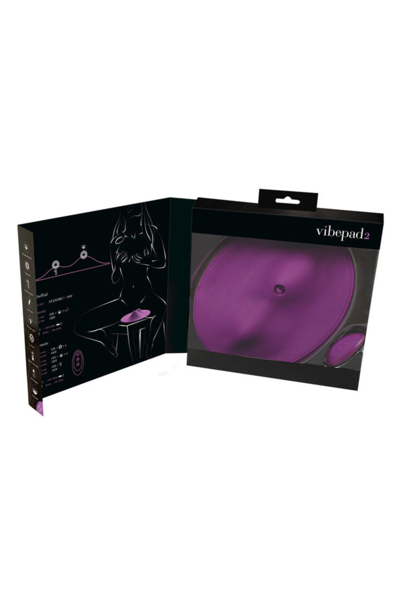 Orion VibePad 2 open package showing purple pad and remote control