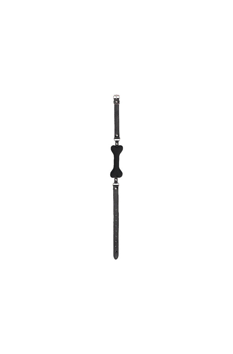 Black Ouch! Puppy Play bone gag laid out flat showing the full adjustable strap