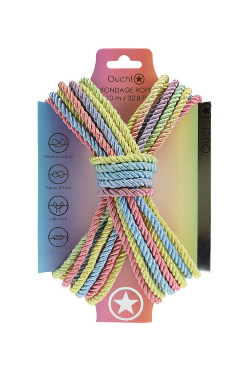 Pastel multicolor twisted bondage rope by Ouch!, 10 m, wrapped on its rainbow packaging with knot guides.