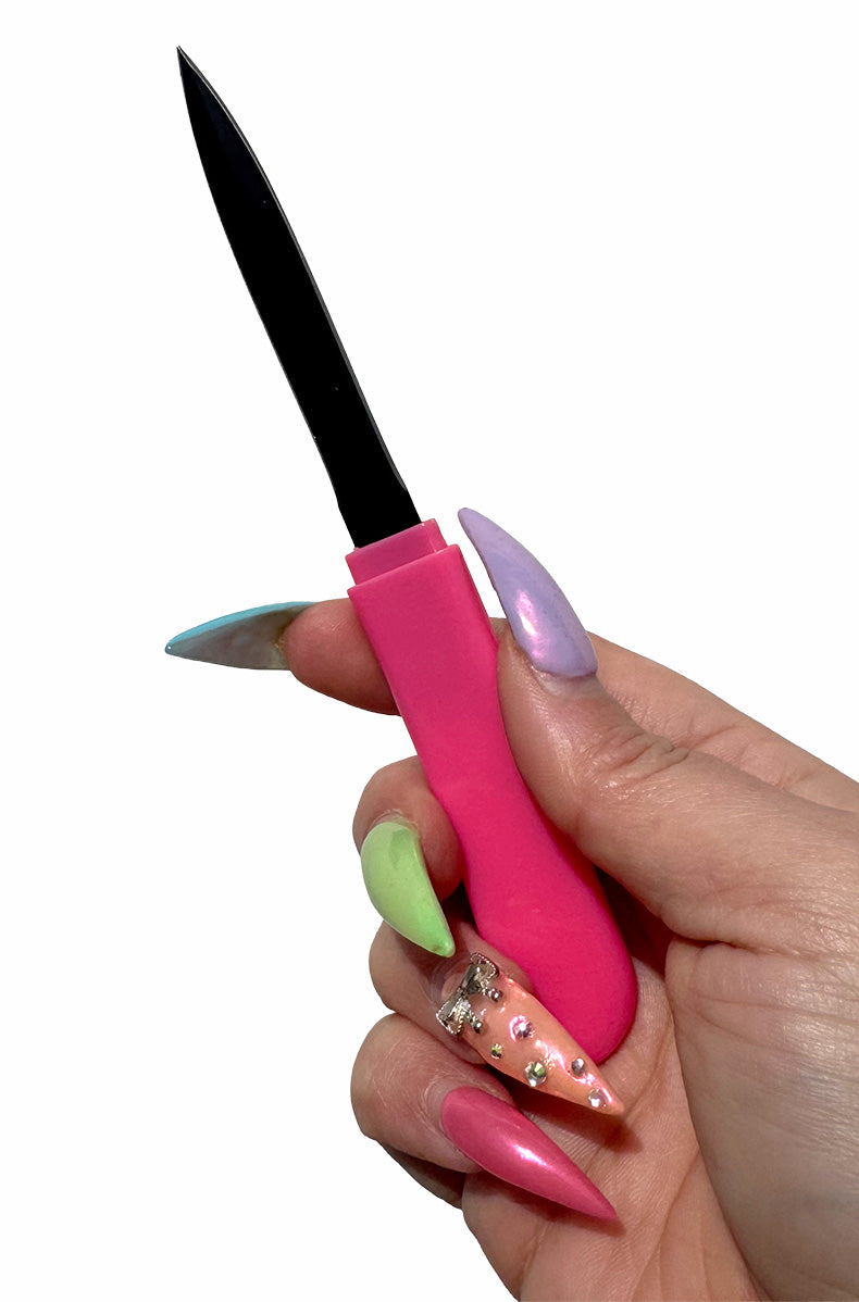 Woman using pink comb knife for everyday self defense