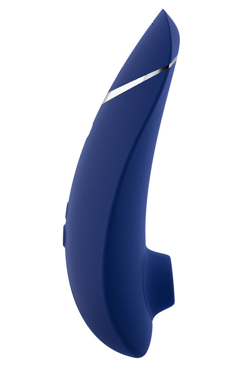Side view of the Blueberry Womanizer Premium 2 with its silver accent stripe and silicone head.