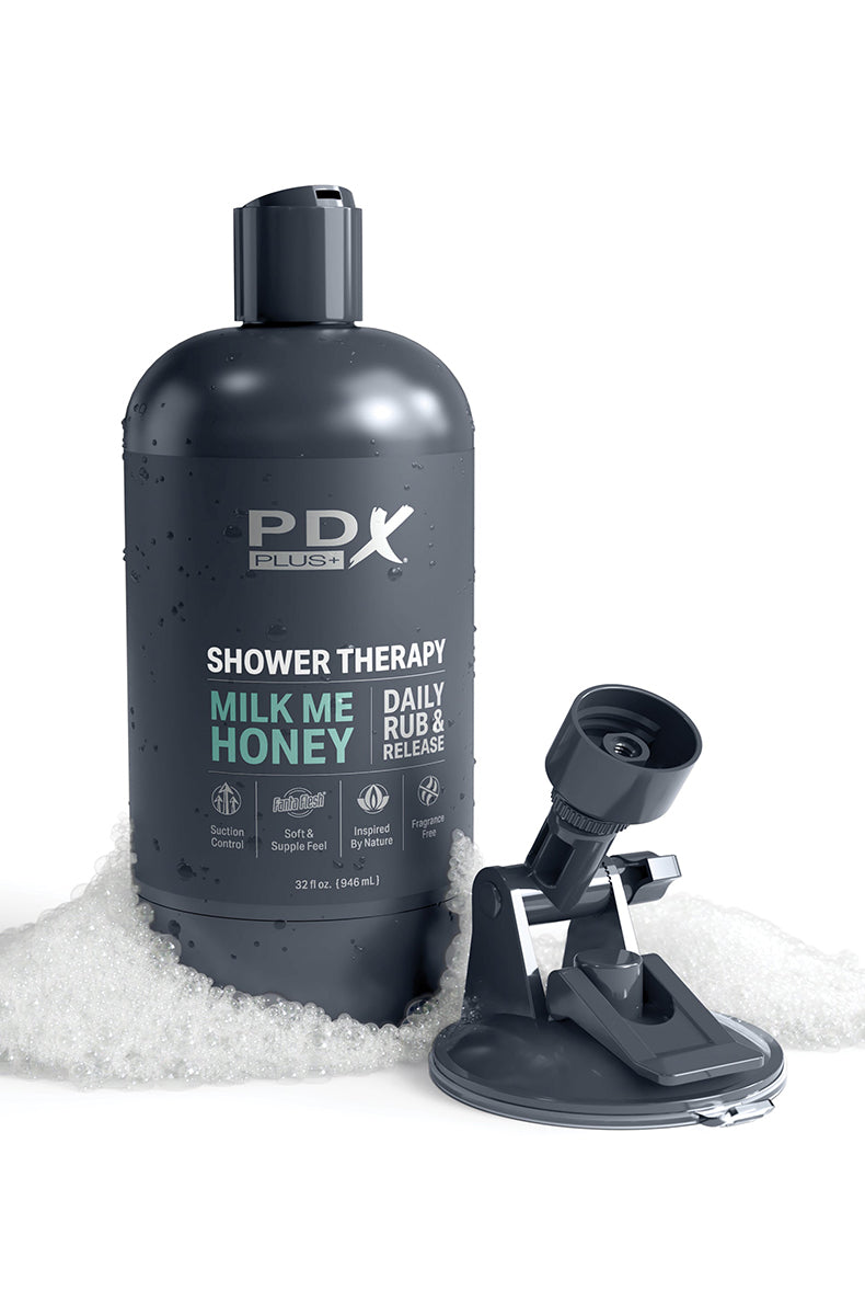 PDX Plus Shower Therapy Milk Me stroker shaped as a 32 fl oz dark gray shampoo bottle with removable suction mount.