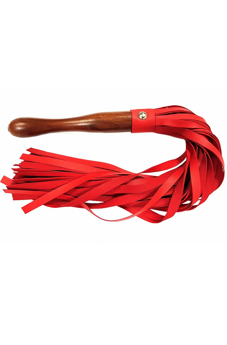 Rouge Fetish Play vegan flogger in red with soft faux leather tails and a polished wooden handle with wrist loop