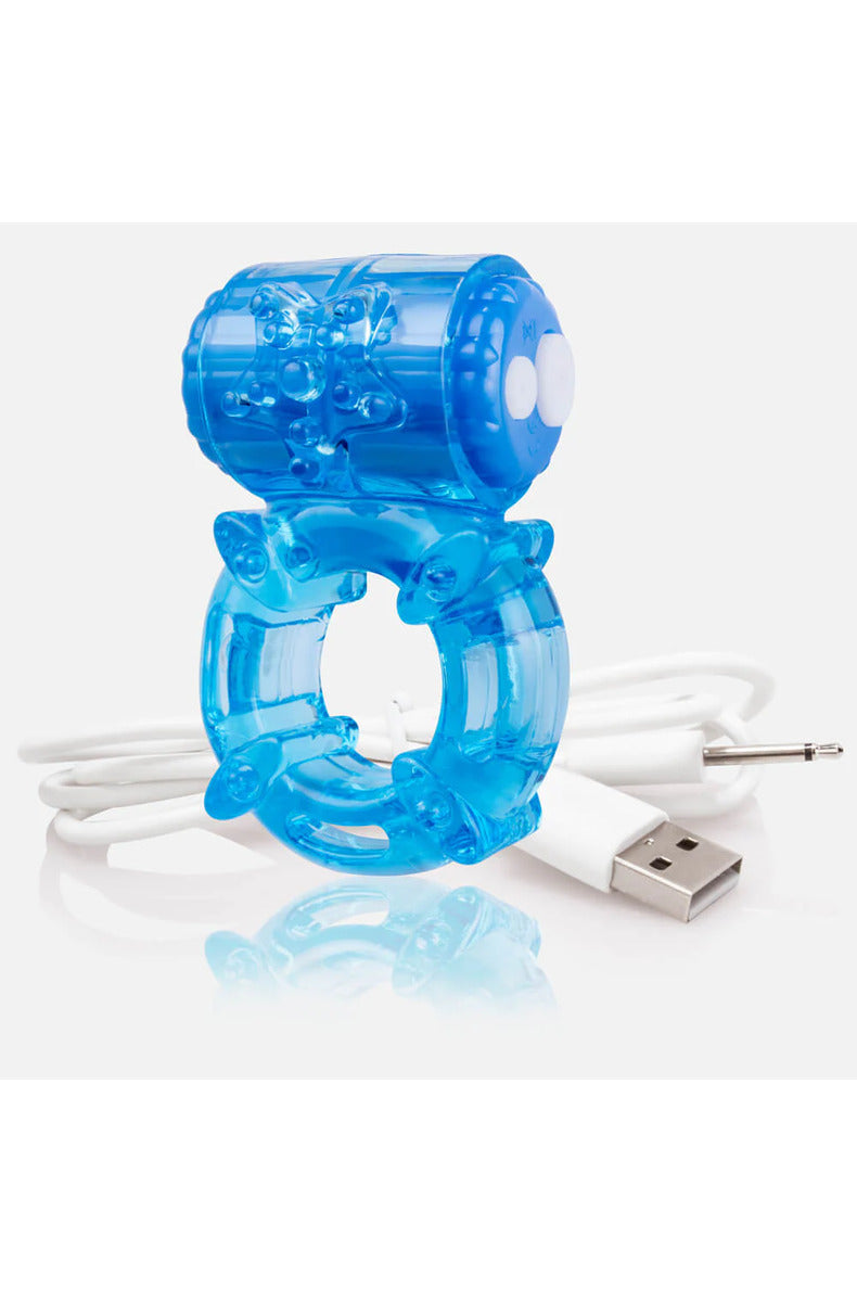 Blue rechargeable vibrating cock ring with a textured motor and stretchy band, with USB cable, on white.