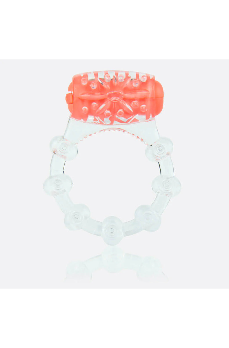 Clear stretchy vibrating cock ring with an orange motor, soft ticklers, and a beaded band, on white.
