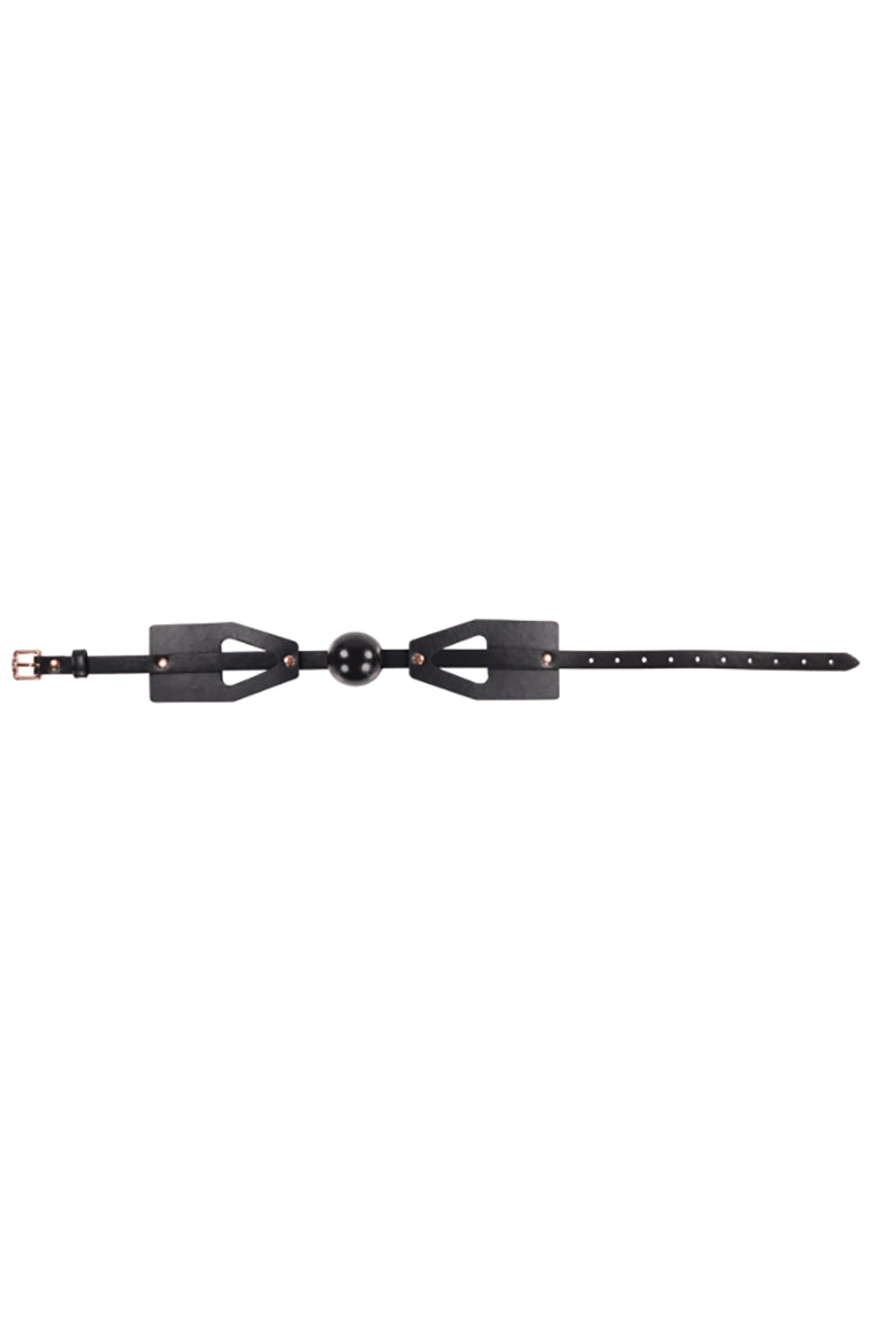 Close-up of black silicone ball with rose-gold buckle hardware and center adjustment strap visible.