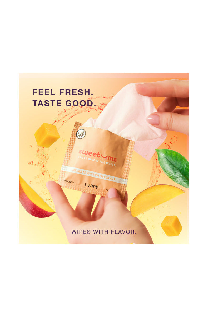 Hands holding a Sweetums intimate wipe packet with mango pieces, text reads Feel Fresh Taste Good.