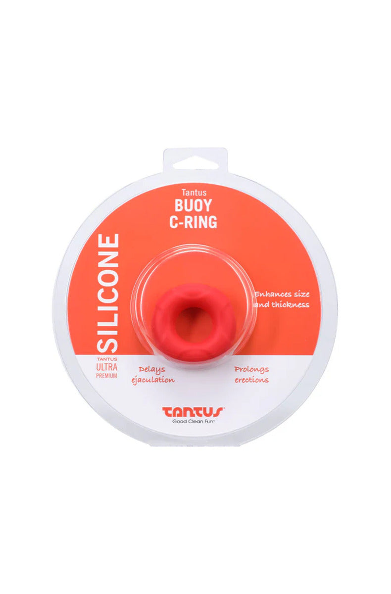 Crimson red Tantus Buoy thick silicone cock ring in its round Tantus package, on a white background.