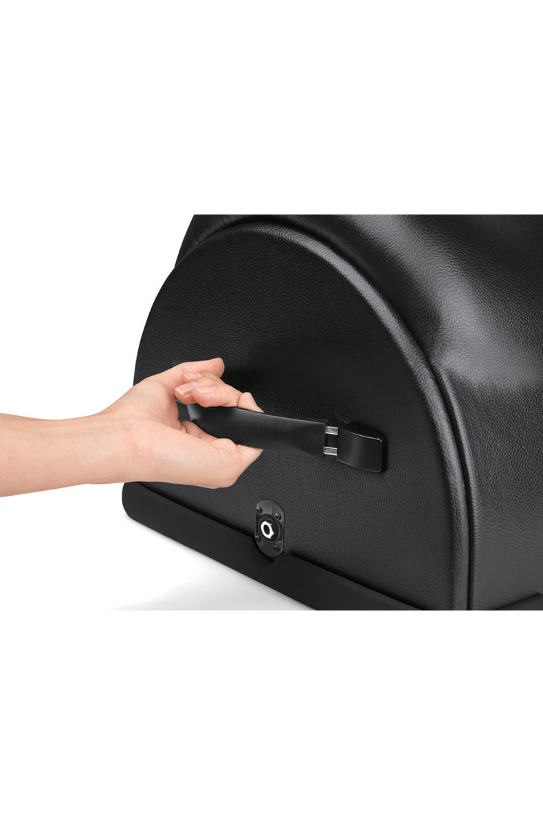 Hand gripping the carry handle of The Cowgirl Premium Riding Sex Machine