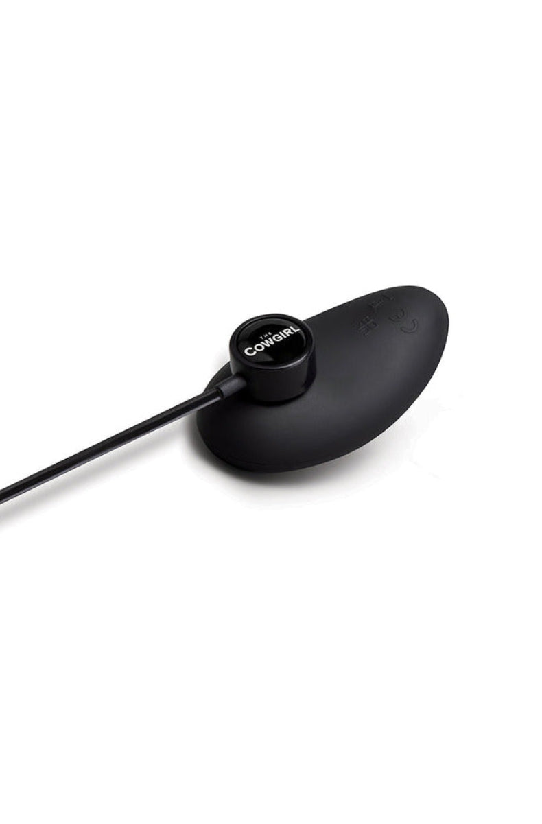 The Cowgirl Saddle base with its magnetic USB charging cord attached