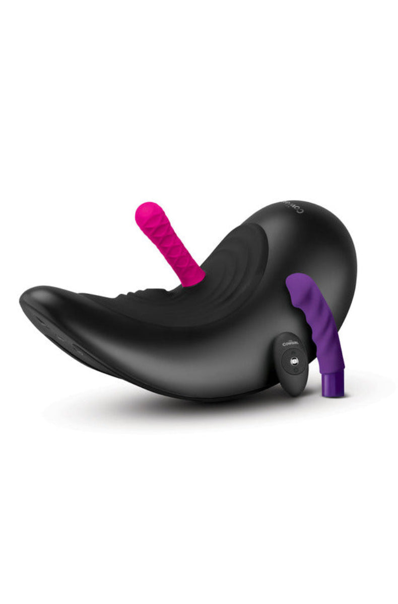The Cowgirl Saddle ride-on sex machine with the pink thrusting and purple vibrating attachments