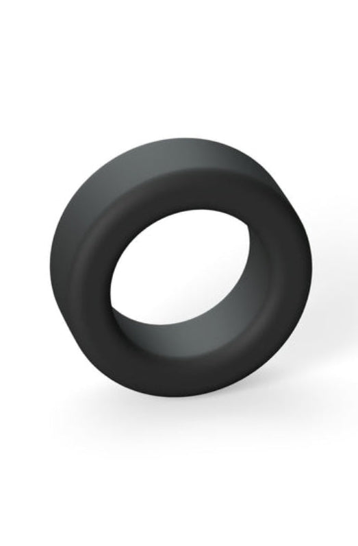 Side view of black silicone cock ring showing thickness and curved profile