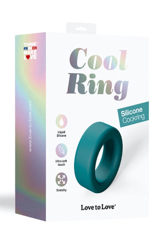 Front view of teal silicone cock ring on white background showing smooth round shape